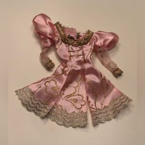 1997 Mattel Rapunzel Barbie Doll pink and gold gown top.
